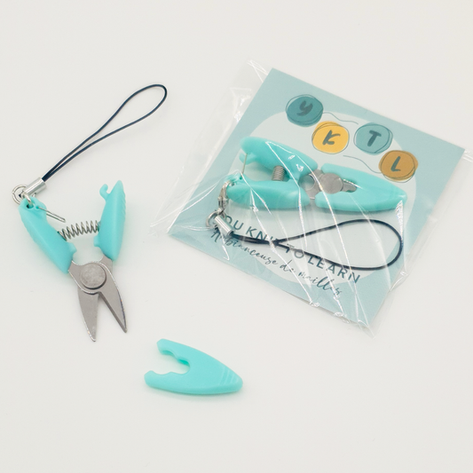 Mini ciseaux avec embout de protection